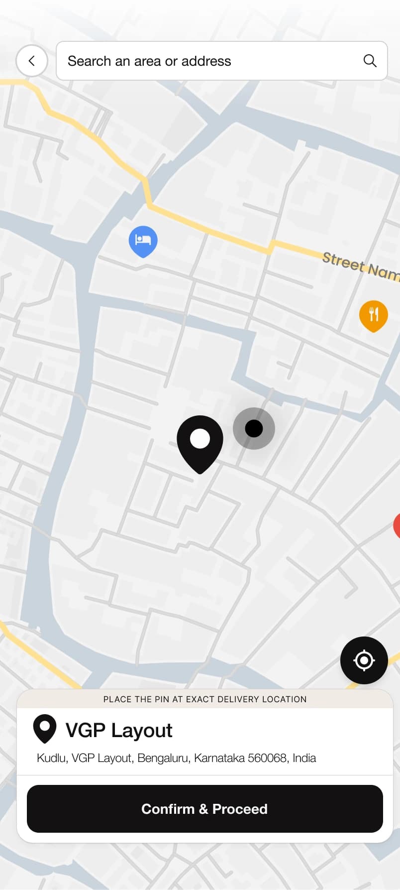 Map search and a draggable delivery pin, with a located address and a Confirm and Proceed action.